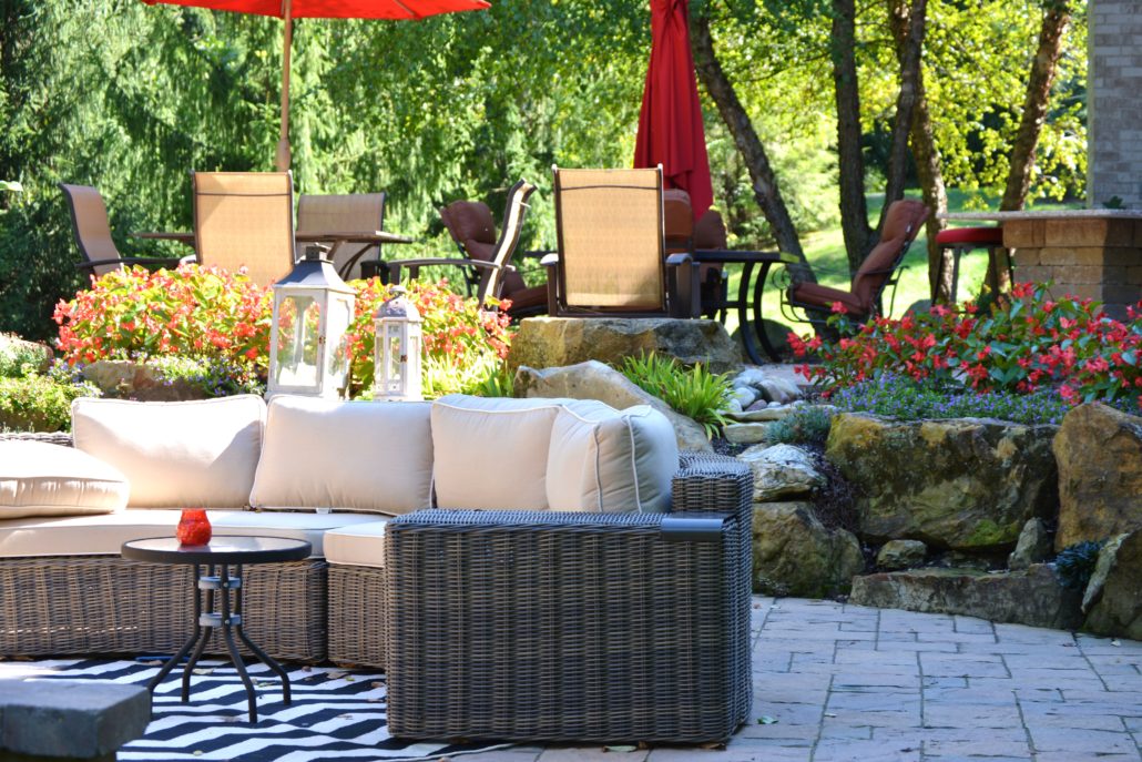 Plant Studio Landscaping back patio with hardscape and patio furniture