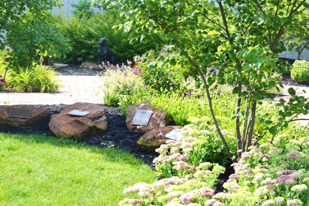 Sponsor rocks surrounded by pro landscaping
