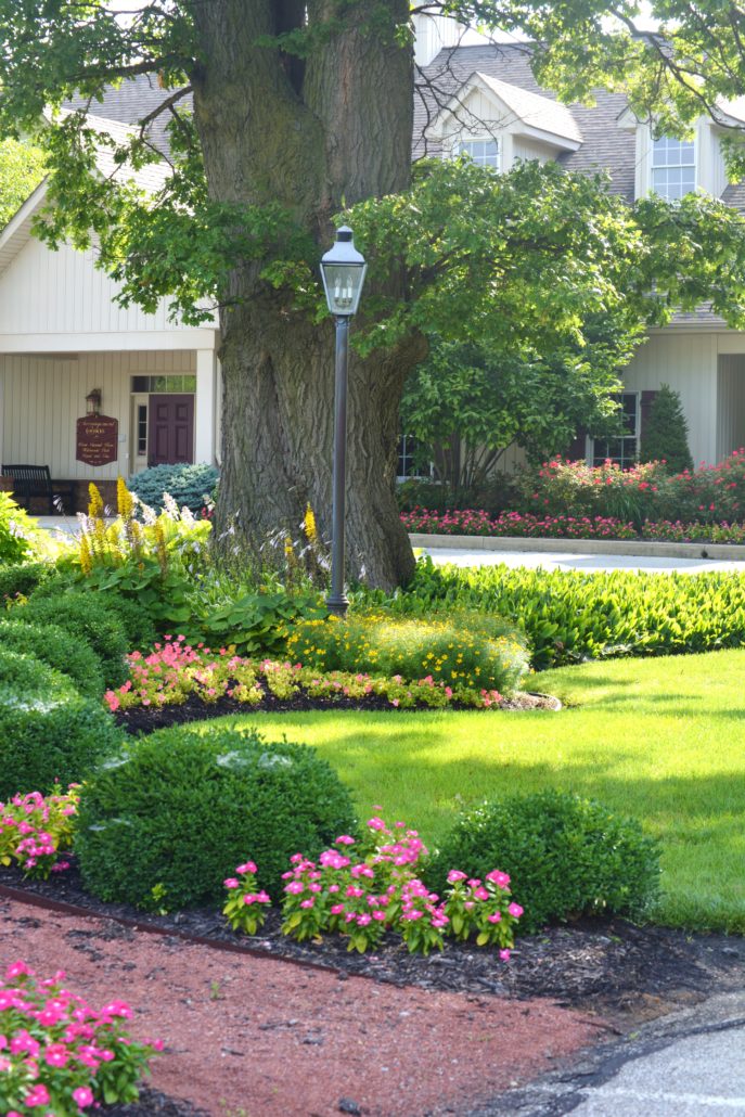 Custom flower beds in front of building